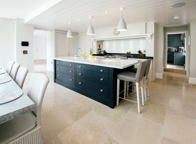 Elegant central island kitchen design with seating