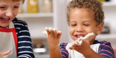 Kid's having fun cooking with their hands