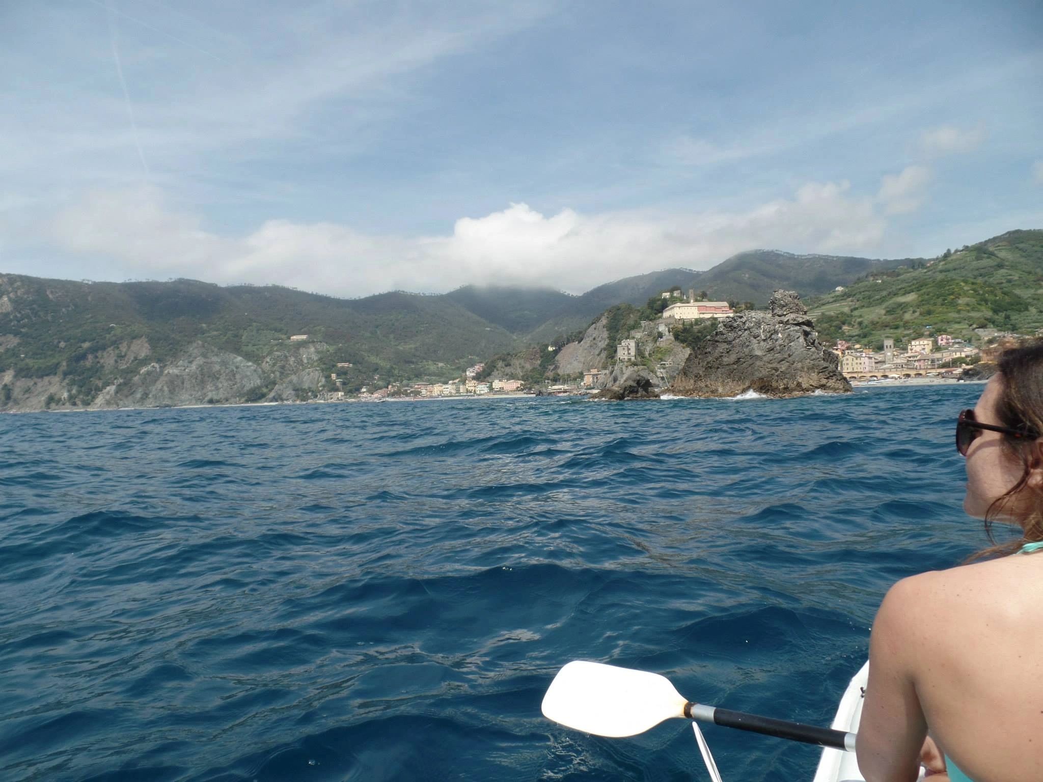 Mrs. Magic Travel Guy kayaking off the coast of Cinque Terre in Italy