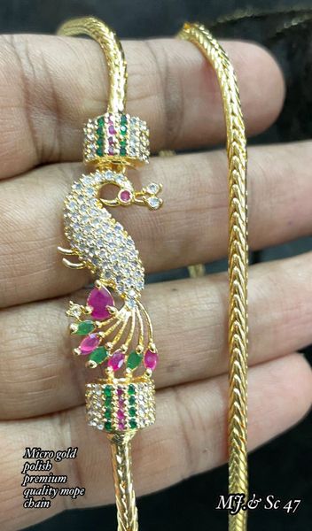 Peacock Side Mogappu Pendant Gold Finish in Long Chain- Ruby,Emerald and White AD Stones!!!