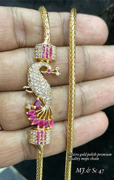 Peacock Side Mogappu Pendant Gold Finish in Long Chain- Ruby, and White AD Stones!!!