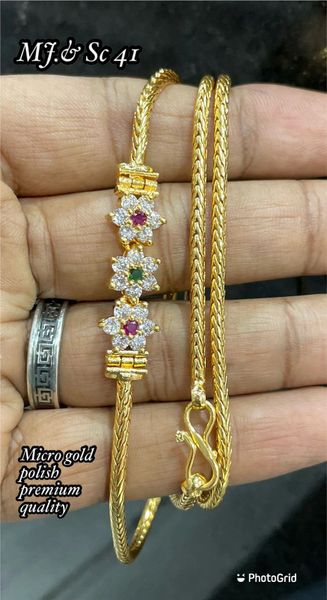 Flower Design Side Mogappu Pendant in Micro-Gold Polish Chain- White,Ruby and Emerald!!!!
