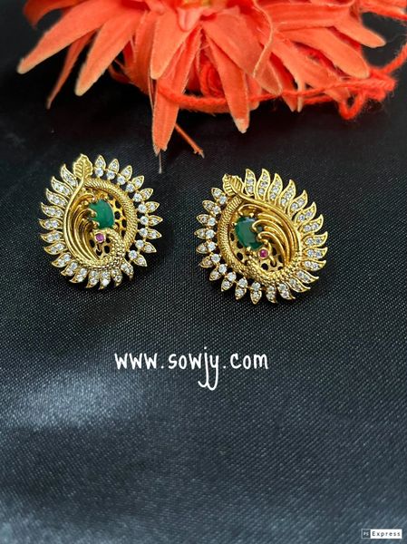 Beautiful Peacock Feather Pattern Gold Finish Earrings- White AD Stones and Emerald!!!