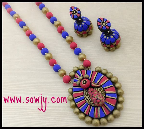 Tear Drop Peacock pendant Set with Medium Sized Jhumkas in Shades of Red and Blue!!!