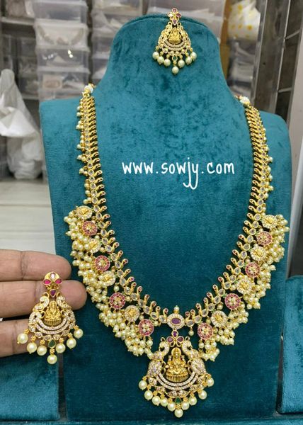 Lakshmi Pendant Grand Guttapusalu Long Haaram with Earrings in Gold Finish!!!!!