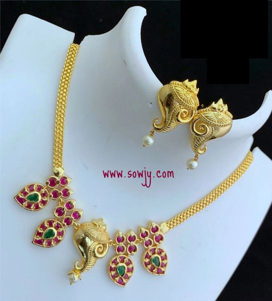 Gold Finish Sangu Pendant Necklace with Matching Earrings- Ruby and Emerald !!!