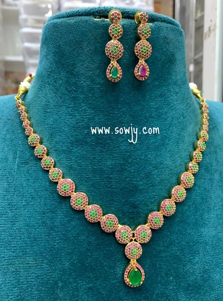 Simple,Elegant and Trendy Designer Gold Finish AD Stone Necklace with Earrings- Ruby and Emerald !!!