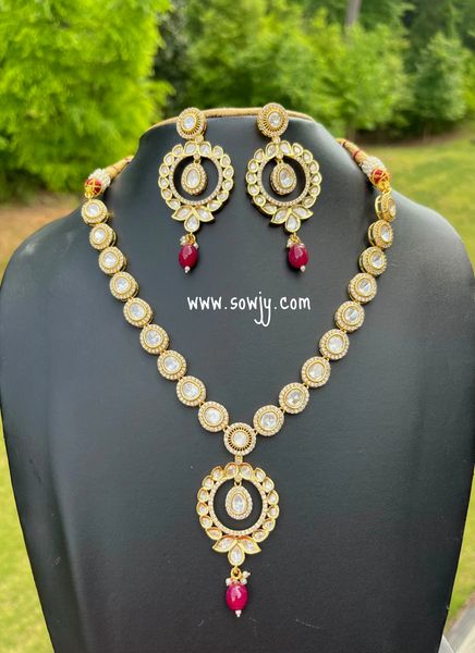 Beautiful Premium Quality Moissanite Big Stones Gold Finish Necklace with Earrings- Red Hanging Beads!!!
