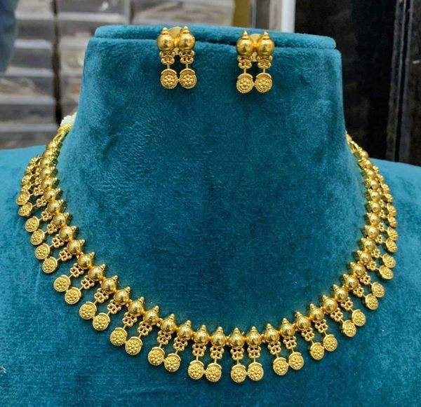 Gold finish elegant designer necklace with earrings