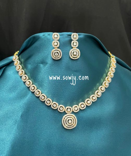 Real Diamond Look ALike Short and Simple Designer Necklace in Gold Finish with Cute Medium Size Earrings!!!!