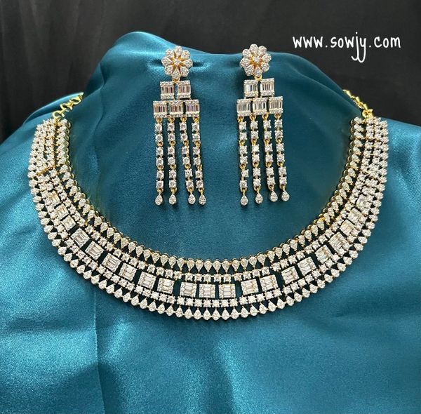Very Grand Diamond Look Alike Premium Quality Broad necklace with Full of AD Stones with Matching Long Stone Earrings !!!