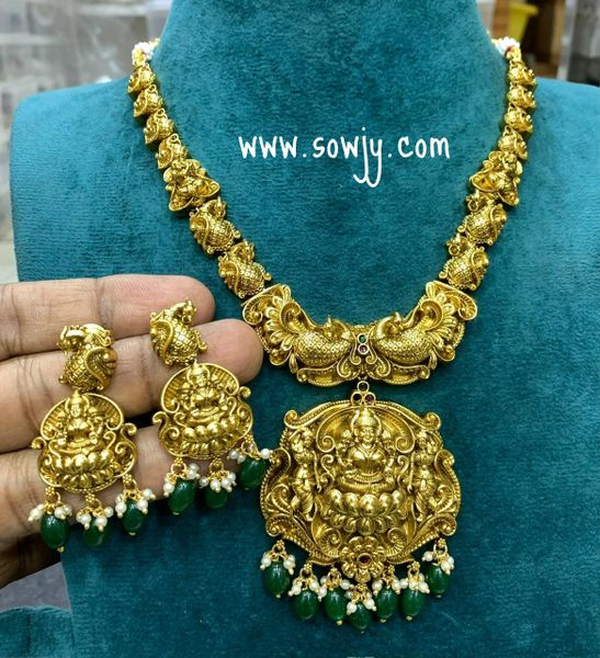 Nakshi 3D Embossed Designer Lakshmi Big Pendant Short Haaram with Earrings in Gold Finish-Emerald and Pearl Hanging Beads!!!