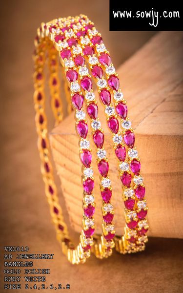 Gold Finish Diamond Look Alike Designer Bangles with Ruby Stones- Set of 4-Size 2.8!!!!