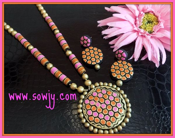 Trendy Hexagon Shaped Terracotta set with Light weighted earrings in Shades of Orange and Pink!!!!