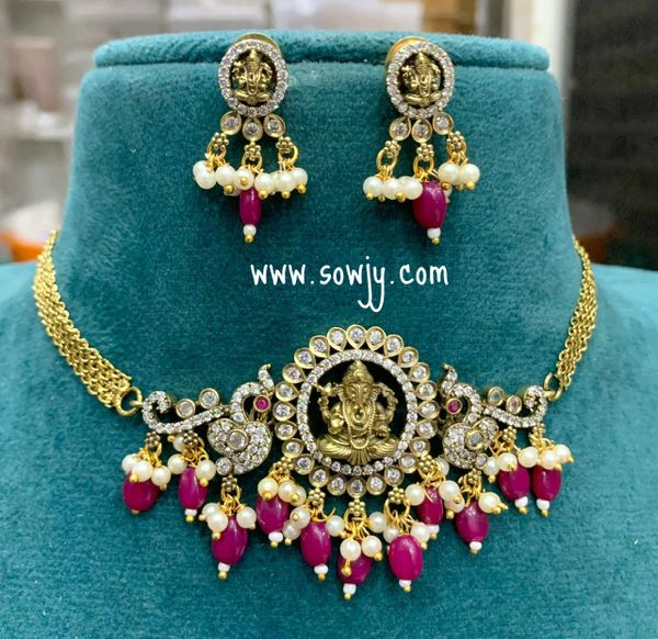 Simple and Elegant Ganesha Peacock Choker set with Earrings- Ruby Hanging Beads!!!!