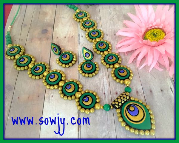 Grand Peacock Feather Haaram In Green,Gold and Blue Shades with Grand Earrings!!!!