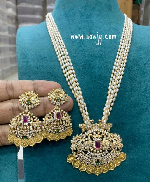 Very Grand Designer AD Stone Peacock Lakshmi Coin Big Pendant in Premium Quality Long Layered Pearl Chain with Designer AD Stone Earrings!!!!