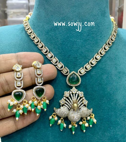 Beautiful Peacock Pendant Victorian Finish Short Necklace with Lovely Earrings- Emerald Green Stone and Hanging Beads
