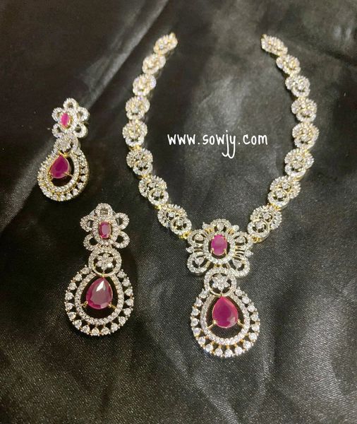 Lovely Floral Pendant Gold Finish Diamond Replica Designer necklace Set with Earrings- Red Stones!!!