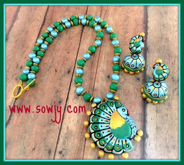 Lovely peacock Terracotta Set in Shades of Dark Green and Metallic Blue Shades with Jhumkas!!!!