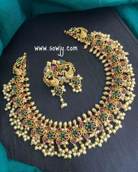 Very Grand Floral Peacock Guttapusalu Short Necklace with Matching Earrings in Gold Finish!!!