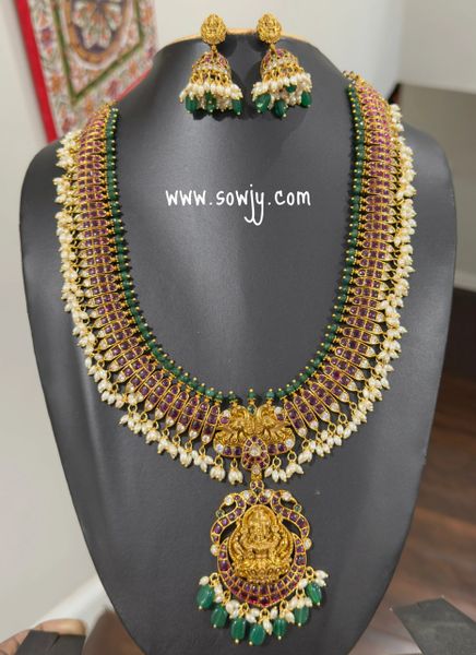 Beautiful Lakshmi Nakshi Gold Finish Pendant Real Kemp Stones Broad and Very Long Haaram with matching Jhumkas-Rice Pearl Hangings!!!