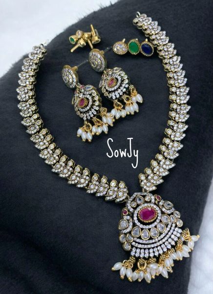 Beautiful Victorian Finish AD Stone Peacock Necklace and Earrings with Changeable Stones in 4 Colors- Red,Green,Blue and White!!!!