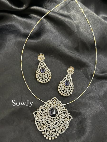 Diamond Look Alike Floral Pendant in Single Line Dual Tone Hasli Necklace with matching Earrings- Purple Stone!!!