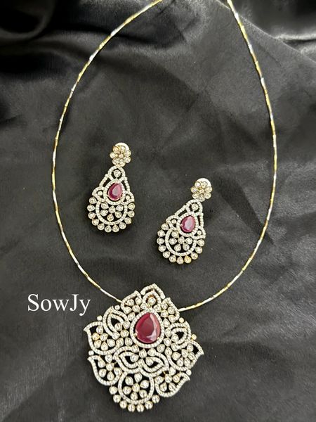 Diamond Look Alike Floral Pendant in Single Line Dual Tone Hasli Necklace with matching Earrings- Red Stone!!!