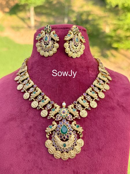 Lovely Peacock Lakshmi Designer Pendant Short Haaram with Matching Bali Type Earrings-Ruby and Emerald