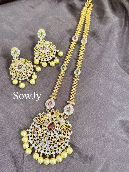 Beautiful Peacock Pendant in Dual Finish-Gold and Rhodium with Uncut AD Stones and Long Designer Chain and matching Earrings!!!