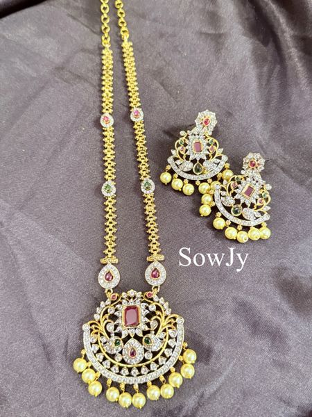 Beautiful Floral Pendant in Dual Finish-Gold and Rhodium with Uncut AD Stones and Long Designer Chain and matching Earrings!!!