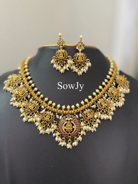 Gold Replica Lakshmi Pendant and Side Pendants Short Guttapusalu Haaram and Matching Earrings with Rice Pearl Hangings!!!