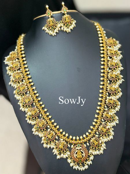 Gold Replica Lakshmi Pendant and Side Pendants Long Guttapusalu Haaram and Matching Earrings with Rice Pearl Hangings!!!
