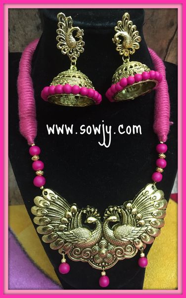 Grand Designer Big Peacock pendant with Large Sized Peacock Jhumkas in Shades of Pink!!!!!!!