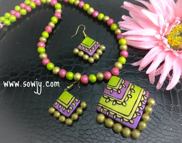 Lovely Diamond Designed Terracotta Pendant Set with hanging Earrings in Shades of Metallic Pink and Neon Yellow!!!!