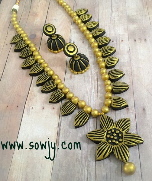 Grand Floral Terracotta Haaram in Black and Gold Shades with Large Sized Jhumkas!!!!
