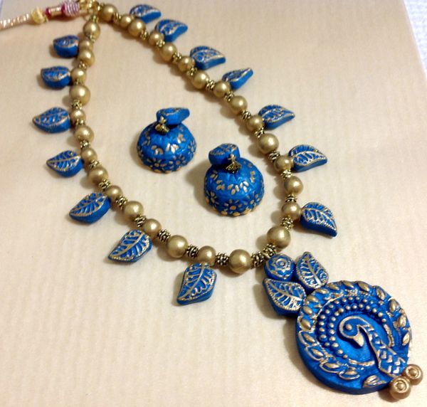Handmade peacock Haaram in Peacock Blue Shade and Gold with light weighted jhumkas!!!!