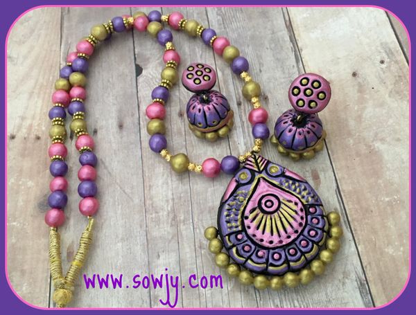 Lovely Terracotta peacock Set with Medium Sized Jhumkas in Shades of Pink and Purple!!!!