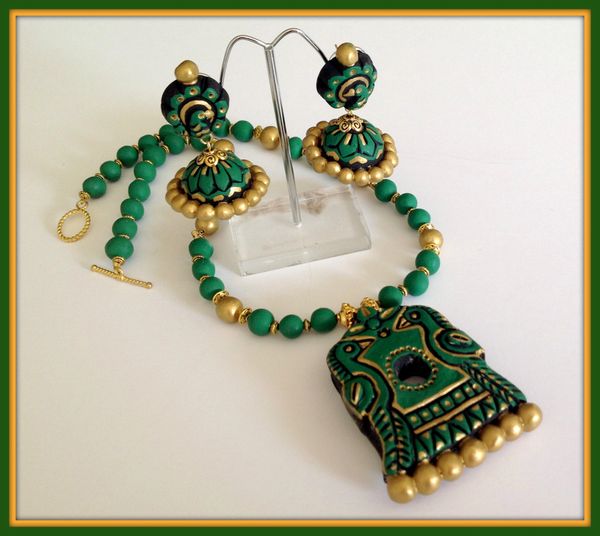 Handmade Peacock in Green and Gold Shades with Peacock Jhumkas!!!!!