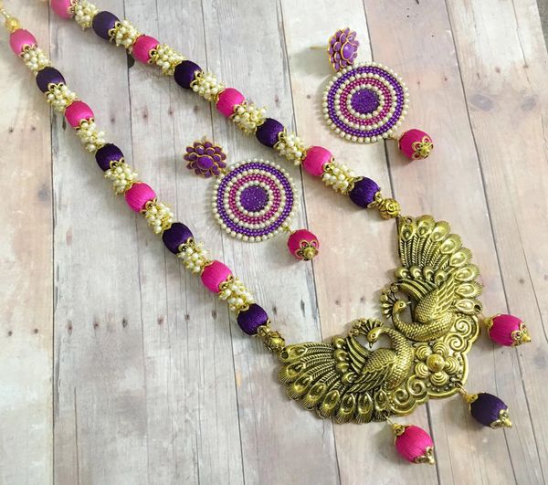 Grand Designer Big Antique peacock Pendant Set with Large Sized Earrings in Purple and Pink Shade!!!