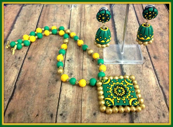 Green and Yellow Terracotta Set with hand carved Floral Design with Jhumkas!!!!!