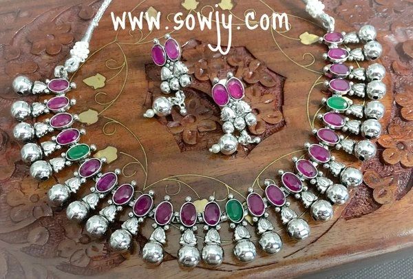 Trendy Silver Plated necklace with Ruby and Emerald Stones and Matching Studs!!!!!!!!