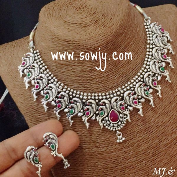 Lovely Peacock oxidised necklace with ruby and emerald stones and matching studs!!!!