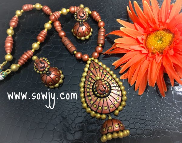 Grand terracotta Ganesha Tear Drop Jhumka pendant with medium Sized Jhumkas in Shades of Copper and Gold!!!!