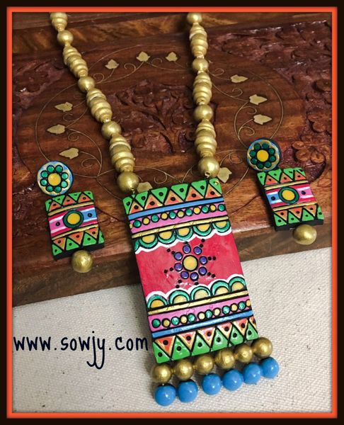 Designer Handmade terracotta Lengthy pendant In Vibrant Colors and Matching Earrings with Golden Beads!!!!