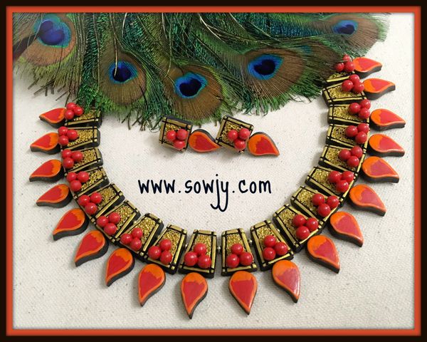 Trendy Designer Handmade Maanga Terracotta Short Necklace with Studs in Shads of Orange,Red and Gold!!!!