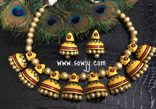 Trendy Terracotta Jhumka Necklace with Jhumka Stud in Shades of yellow and Gold!!!!