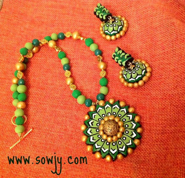 Handcarved Floral pendant and Jhumkas in Shades of Green!!!!!