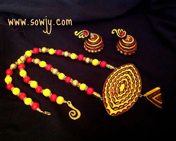 Trendy Oval Carved Design in Red and Yellow Combo with Jhumkas!!!!